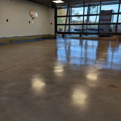 Polished concrete floor in Spartanburg with a smooth, reflective finish inside a commercial space.