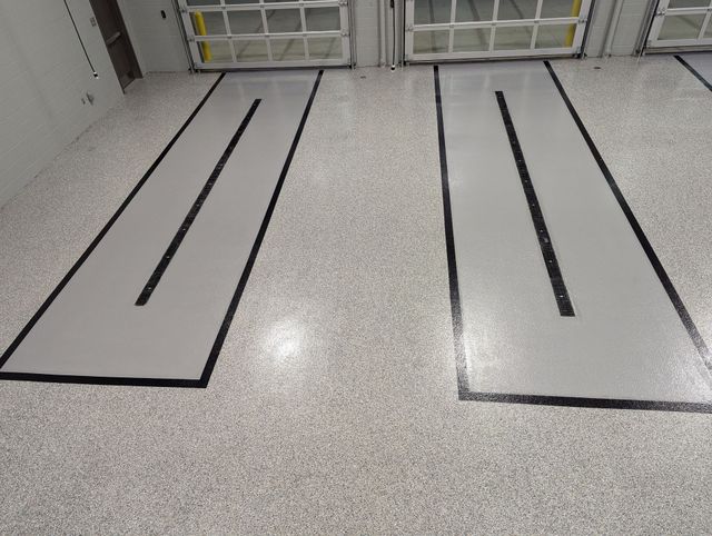 Epoxy flake floor with custom parking lines at an EMS station in Brevard, NC