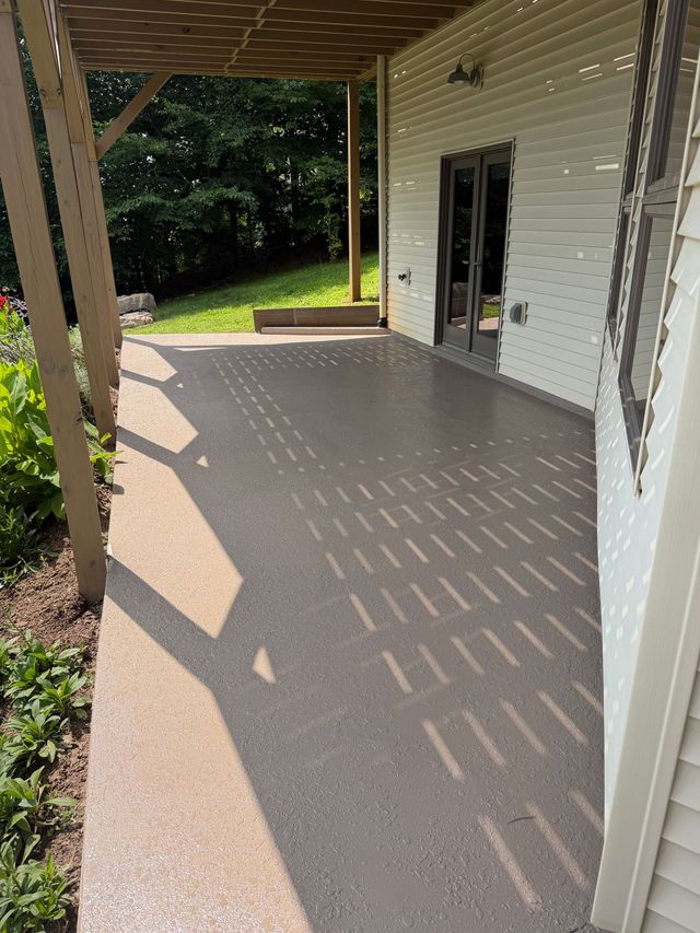 Knockdown texture overlay patio with sand buff sealer in Asheville, NC