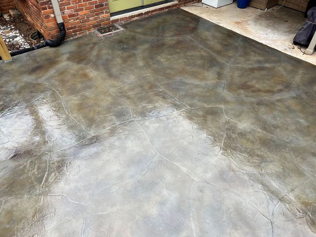Flagstone-scored concrete overlay patio in Hillcrest, SC
