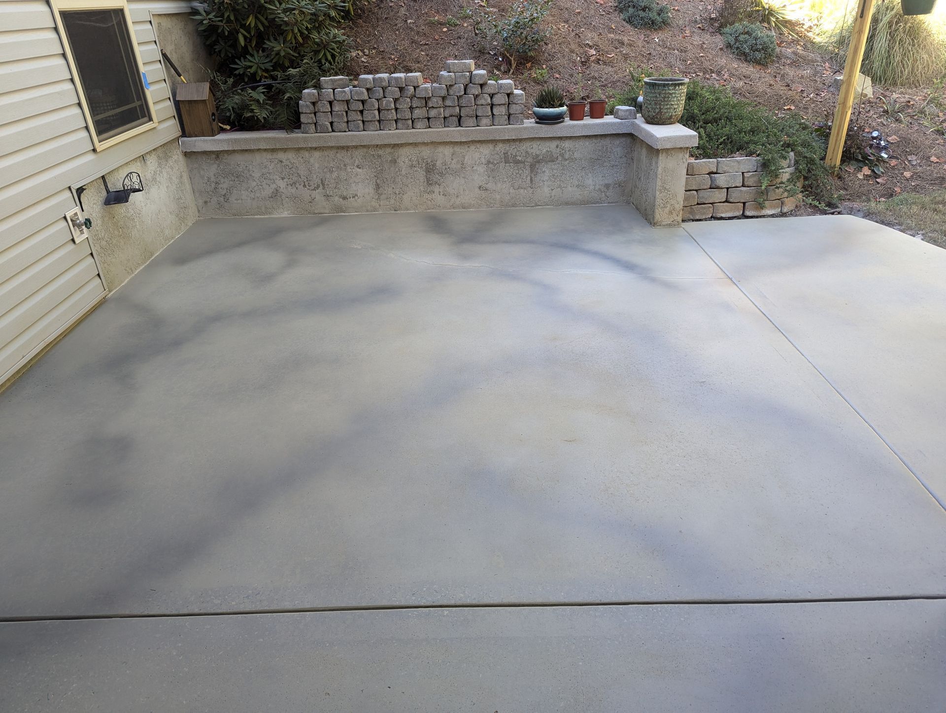 newly stained and sealed concrete patio
