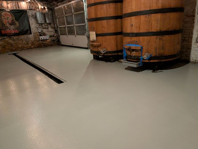 Double broadcast epoxy floor at Burial Beer Co. in Asheville, NC