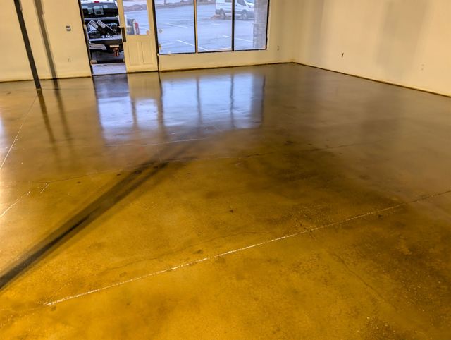 Layered nutmeg stained concrete office floor in Taylors, SC