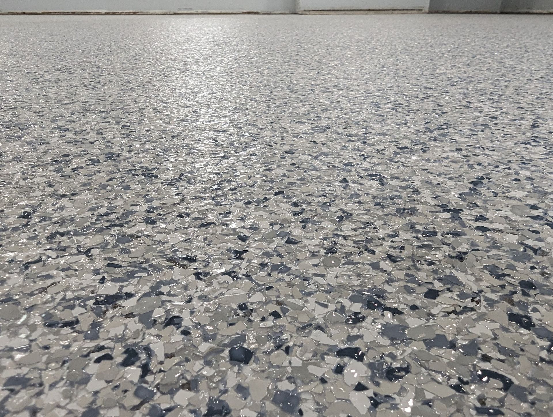 Epoxy garage floor in Spartanburg with a smooth, polished gray finish.