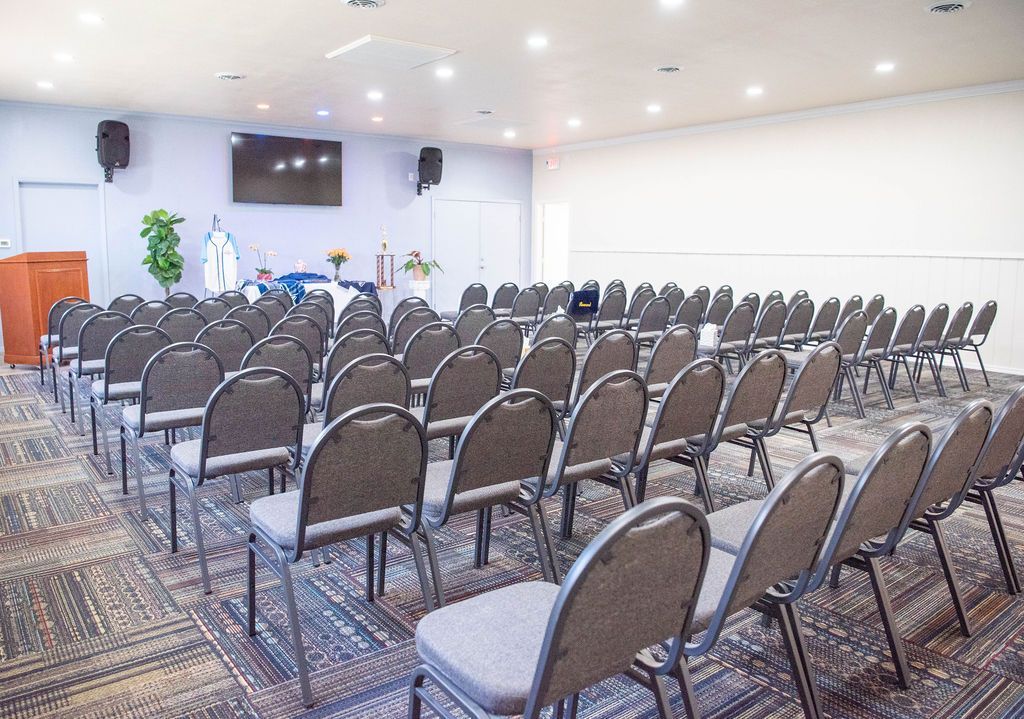 Chapel seating prepared for funeral and memorial services.