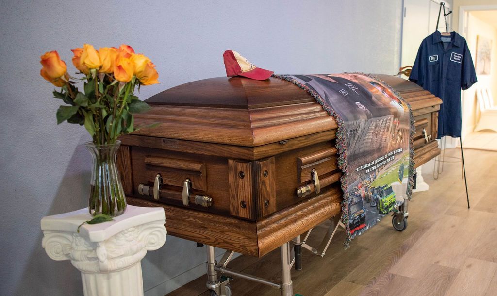 Personalized funeral and cremation ceremony with ceremonial casket and memorial display at ClearPath Cremation Center.