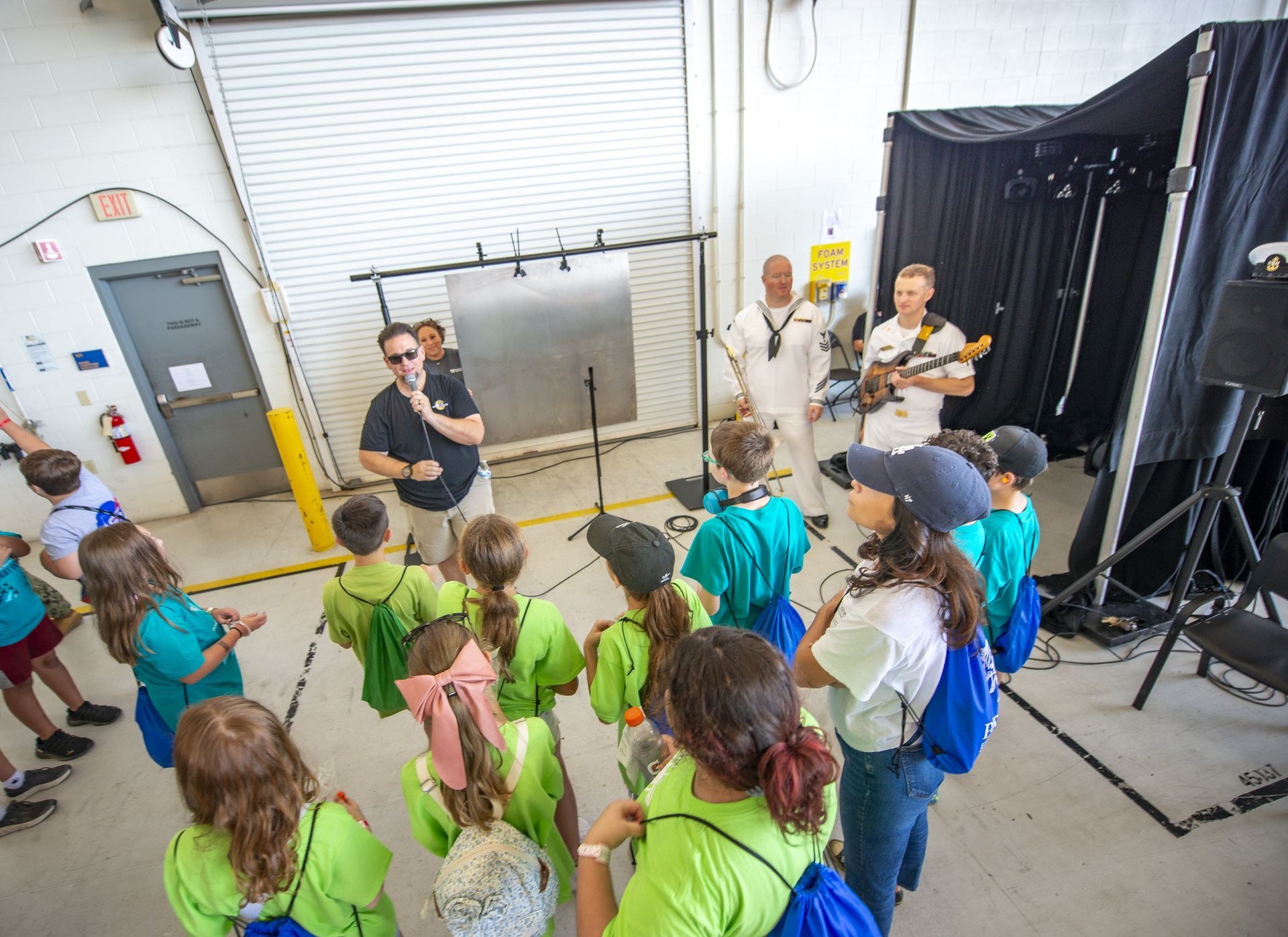 Youth listening to the Navy Band.