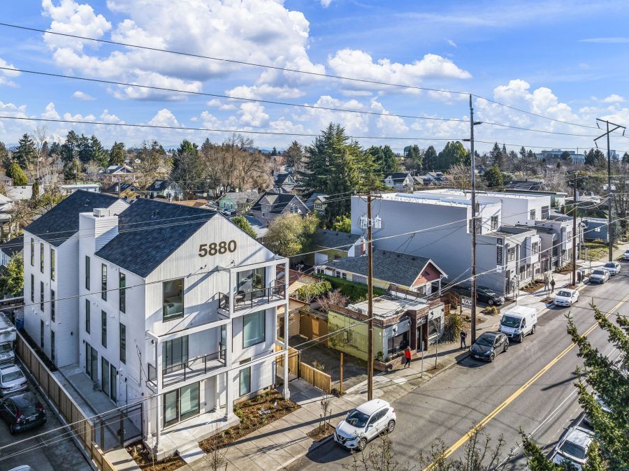 An aerial view of a residential area with a building that says 5080 on it.