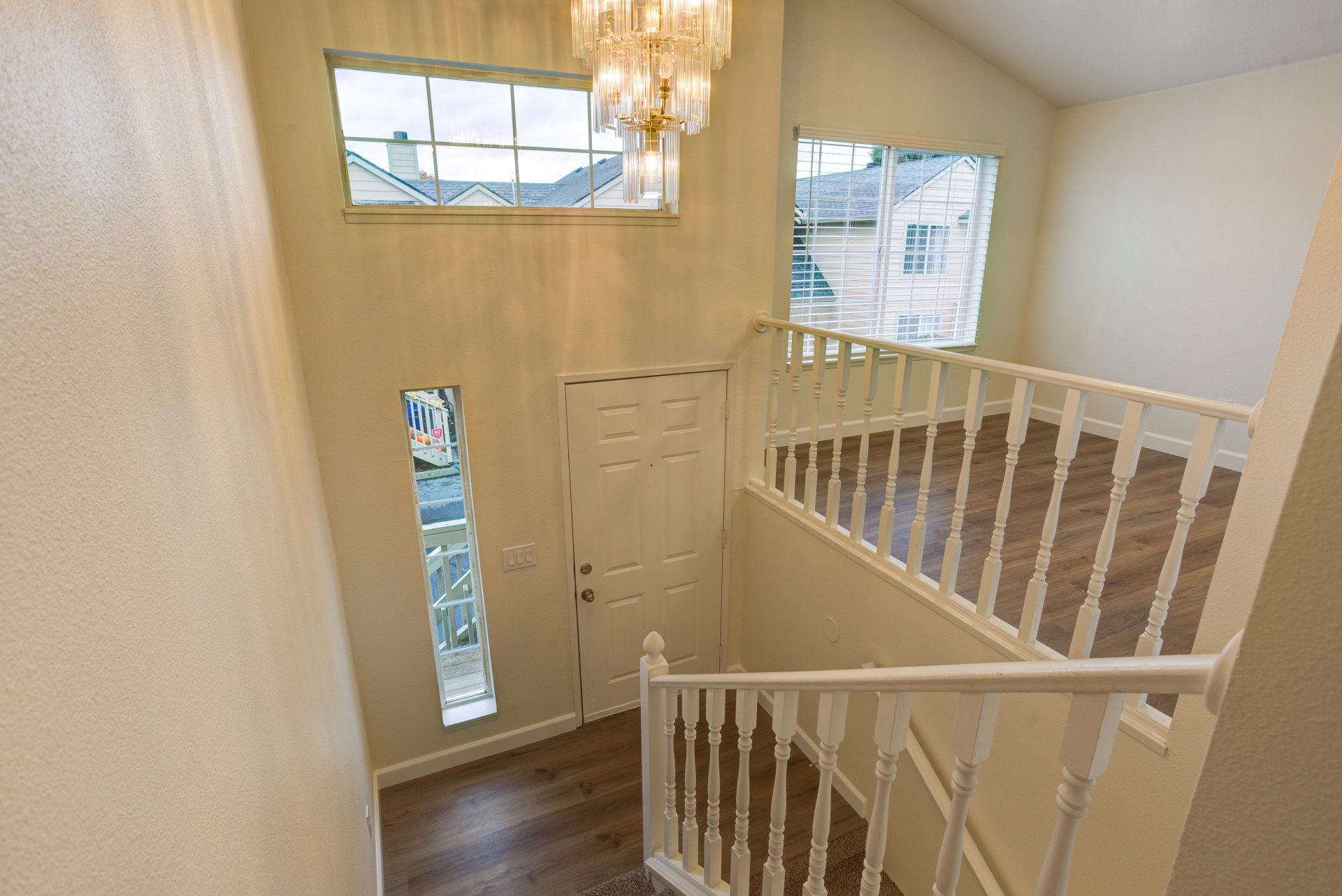 There is a staircase leading up to the second floor of a house.