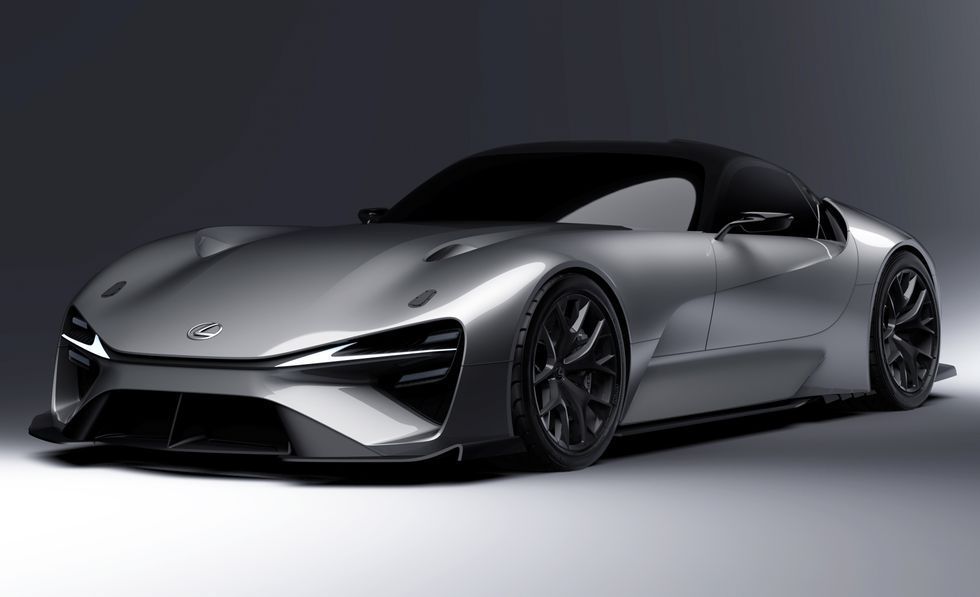 Silver sports car on a studio background, shown in a sleek front three-quarter view