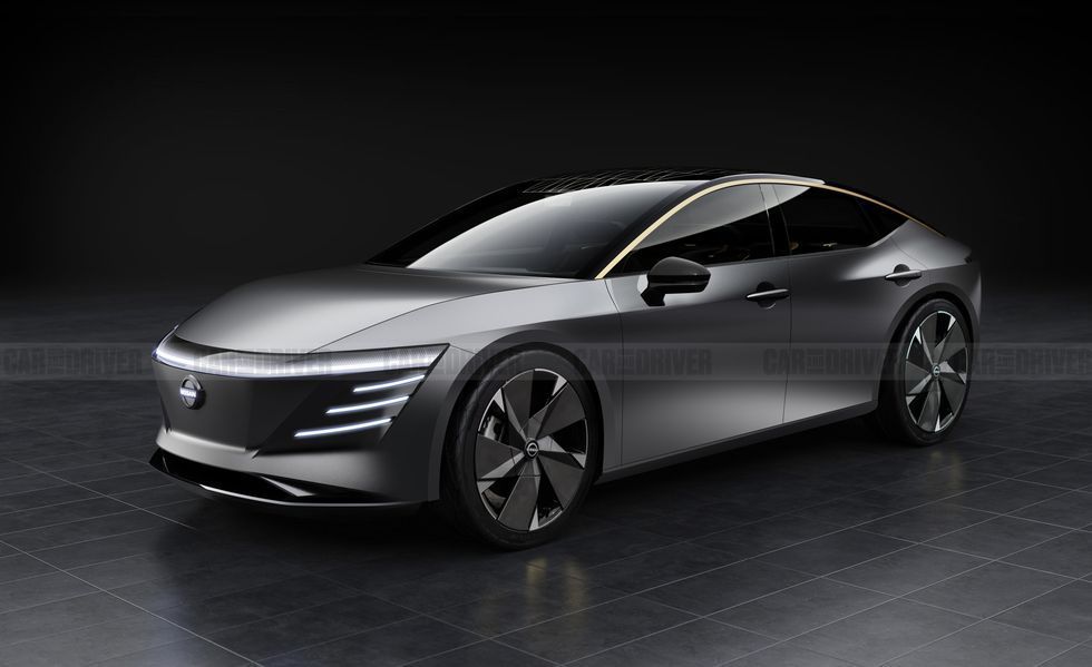 Silver futuristic electric sedan shown in a studio, front three-quarter view