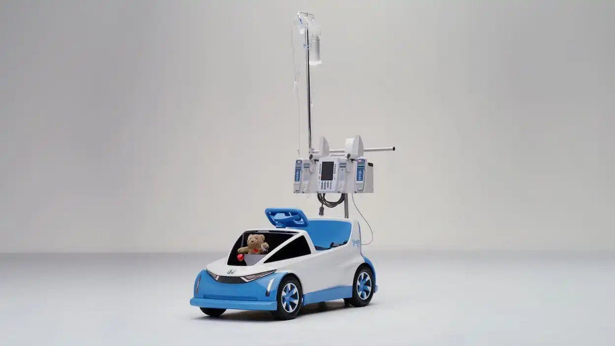 Blue toy car with a raised robotic arm on a white background