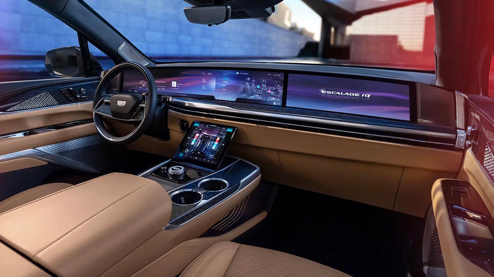 Luxurious car interior with tan seats, futuristic dashboard screens, and steering wheel at dusk