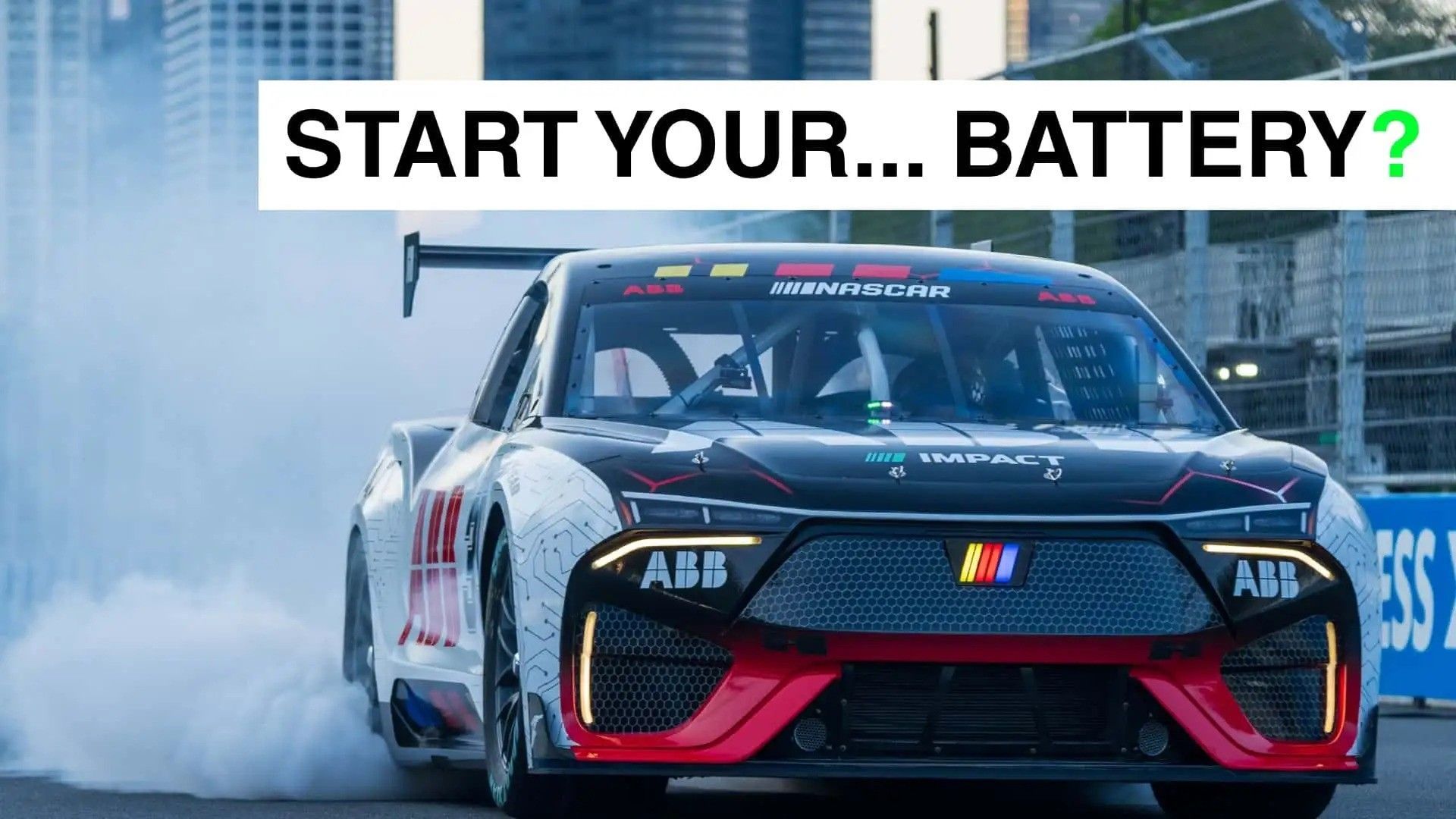 Race car drifting on a track with smoke, under a banner reading “START YOUR... BATTERY?”