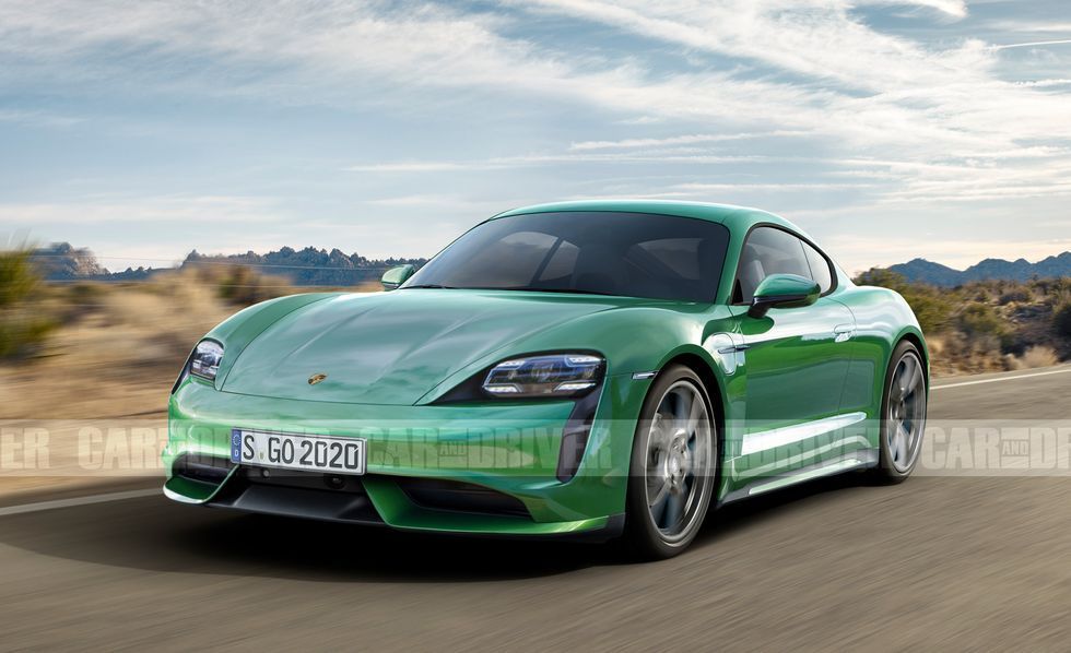 Green Porsche sports car driving on a road in a desert landscape.