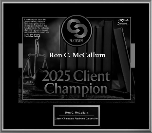 Black award plaque reading “Ron C. McCallum 2025 Client Champion” with Platinum distinction.