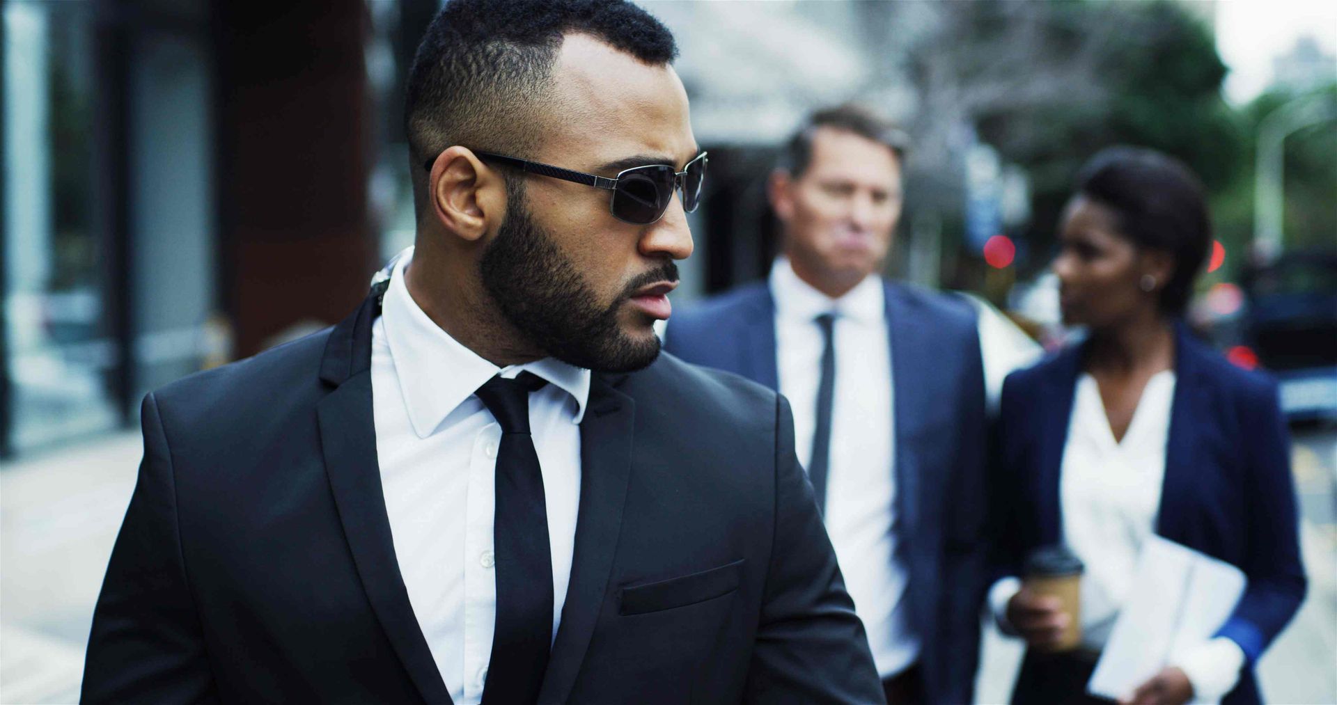 Security service professional providing close protection to client. near Lexington, KY