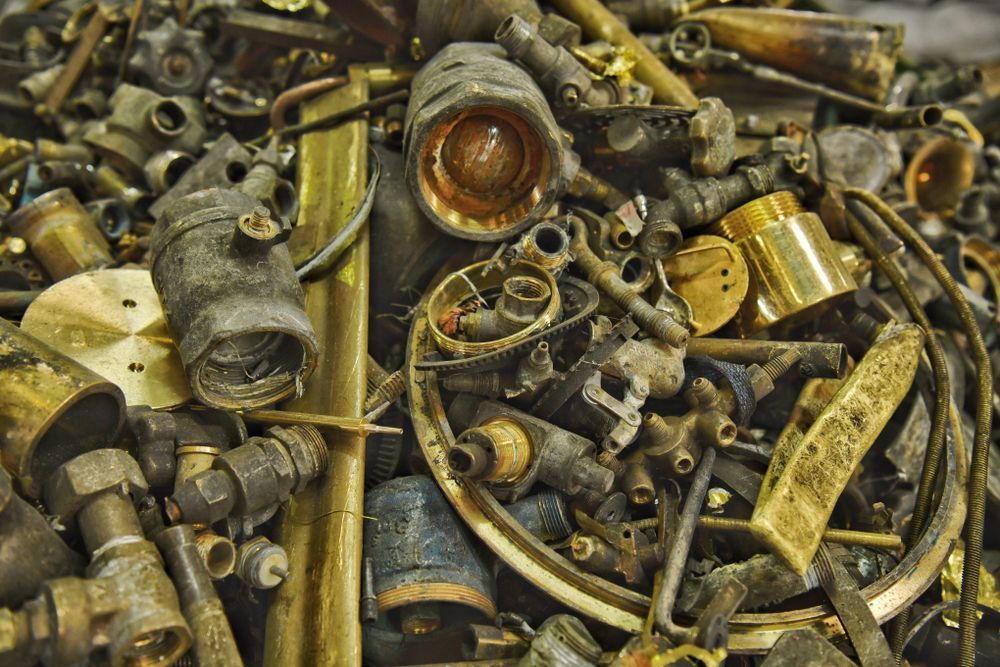 Pile of Brass Scrap Metal, Including Pipes and Fittings, in Various Shapes and Sizes  — B & B Scrap Metal in Noosaville, QLD