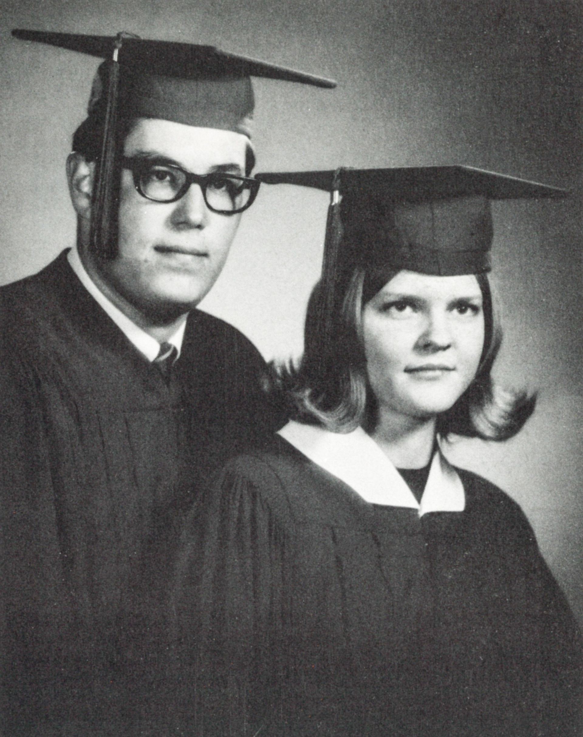 Guy and girl in cap and gown