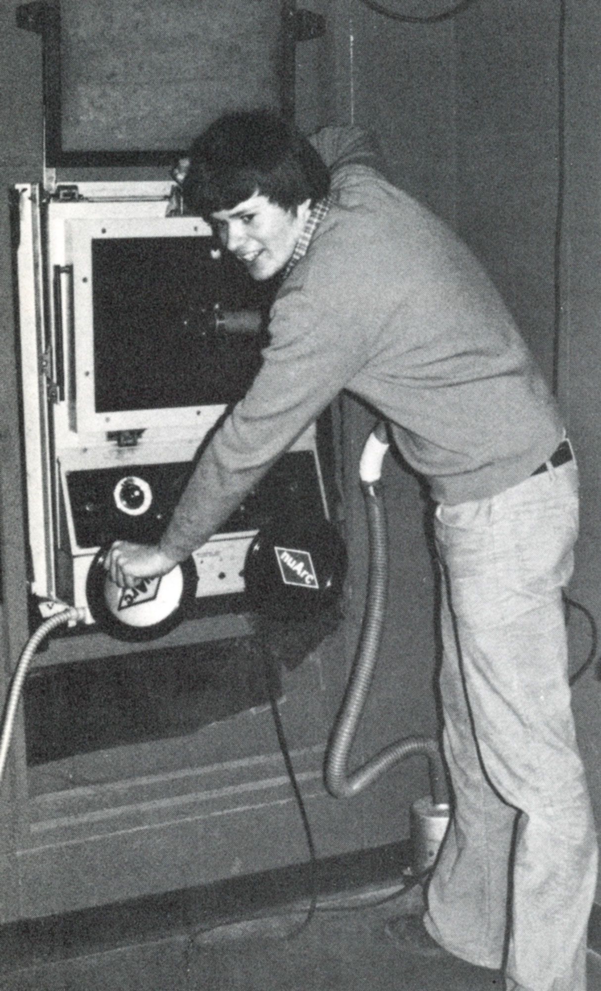 Male student operating equipment - Practical Arts Program