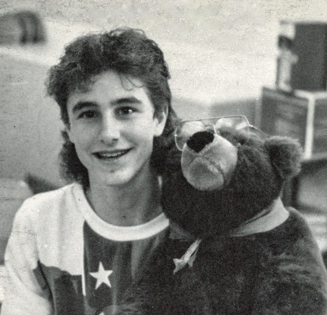 Male student with teddy bear