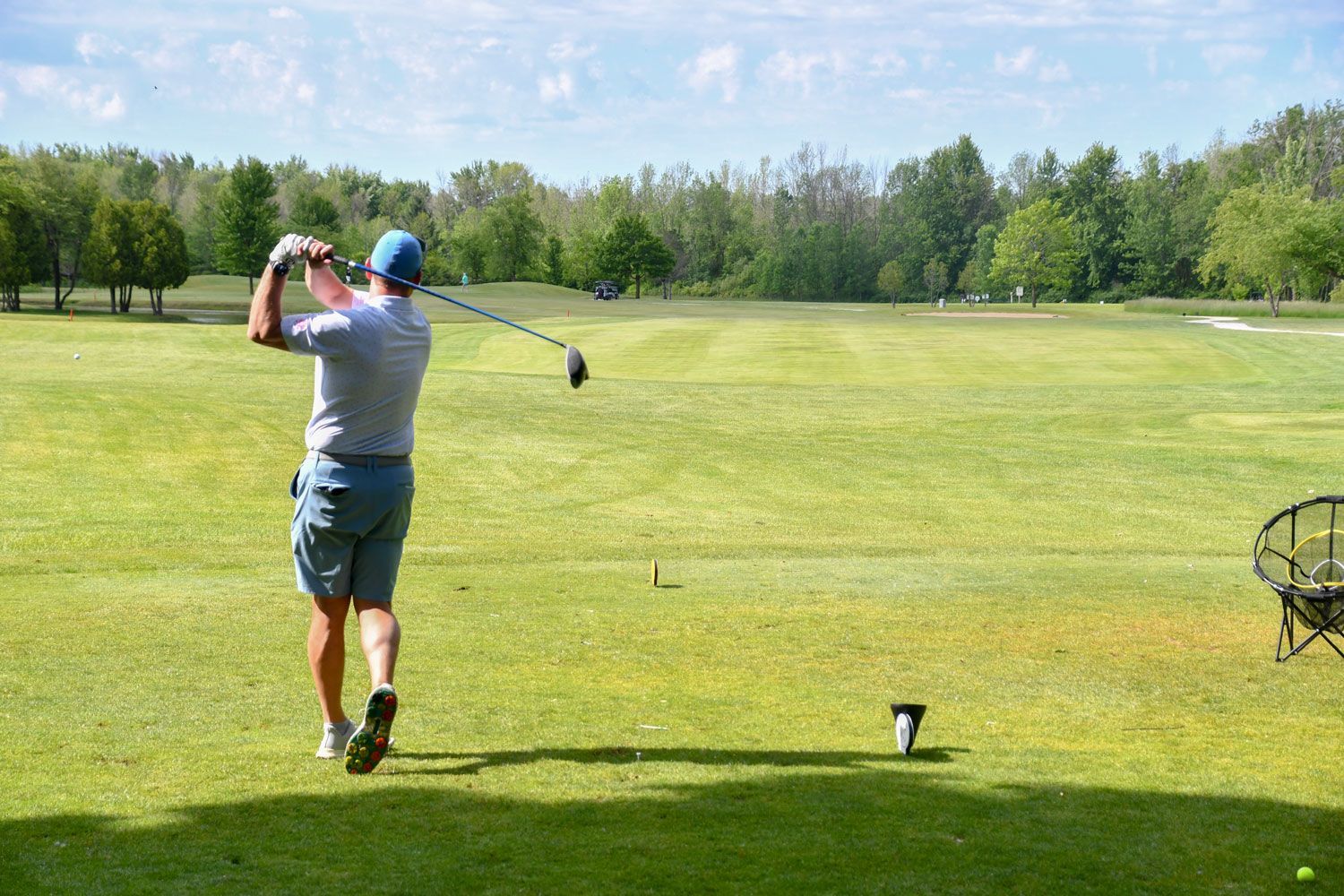 Golfer hitting the ball at Wander Springs in Greenleaf