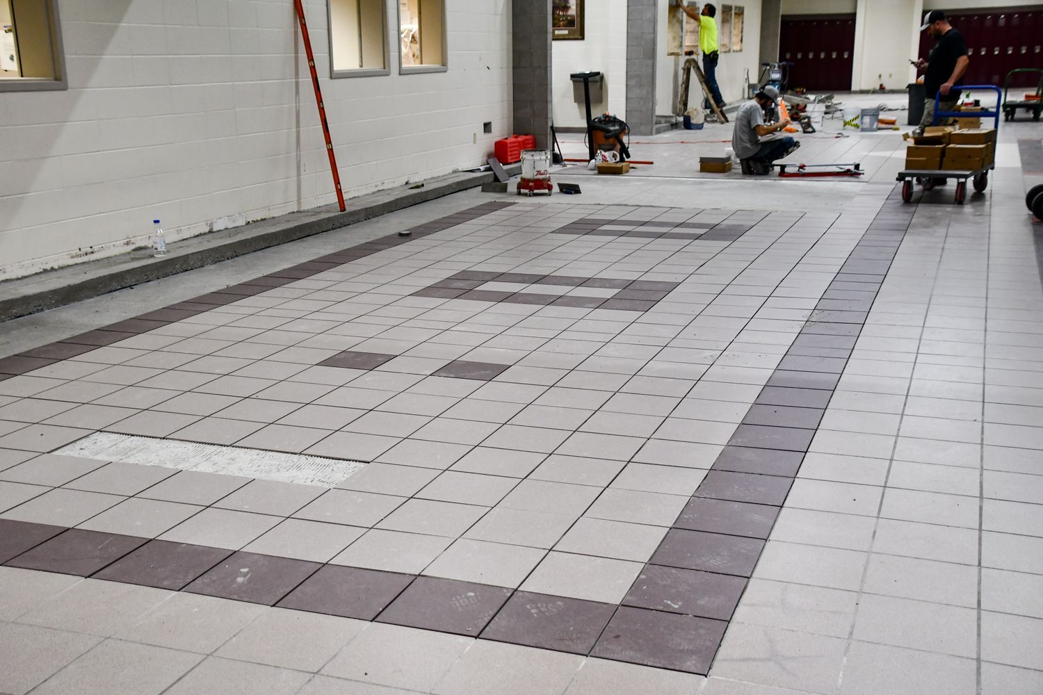 Tiling being done in the former pits area