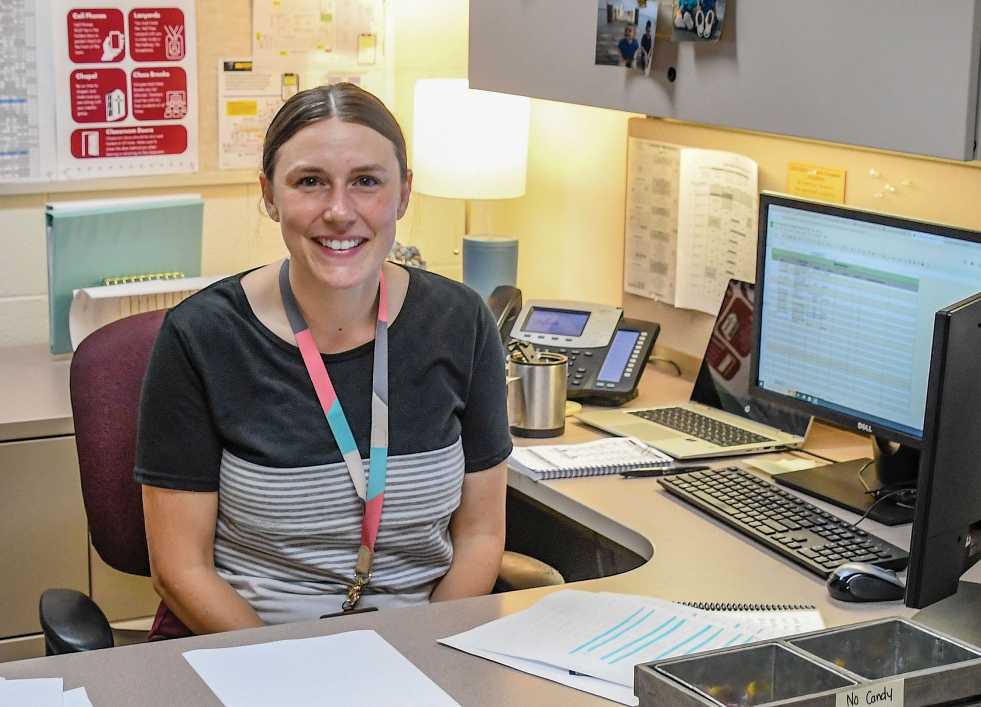 Kristen Zuberbier at her desk, smiling at the camera