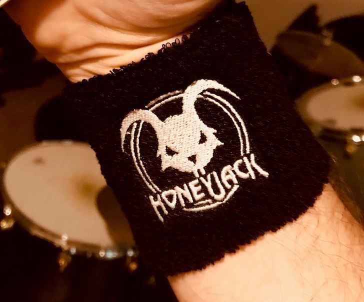 Black wristband with white