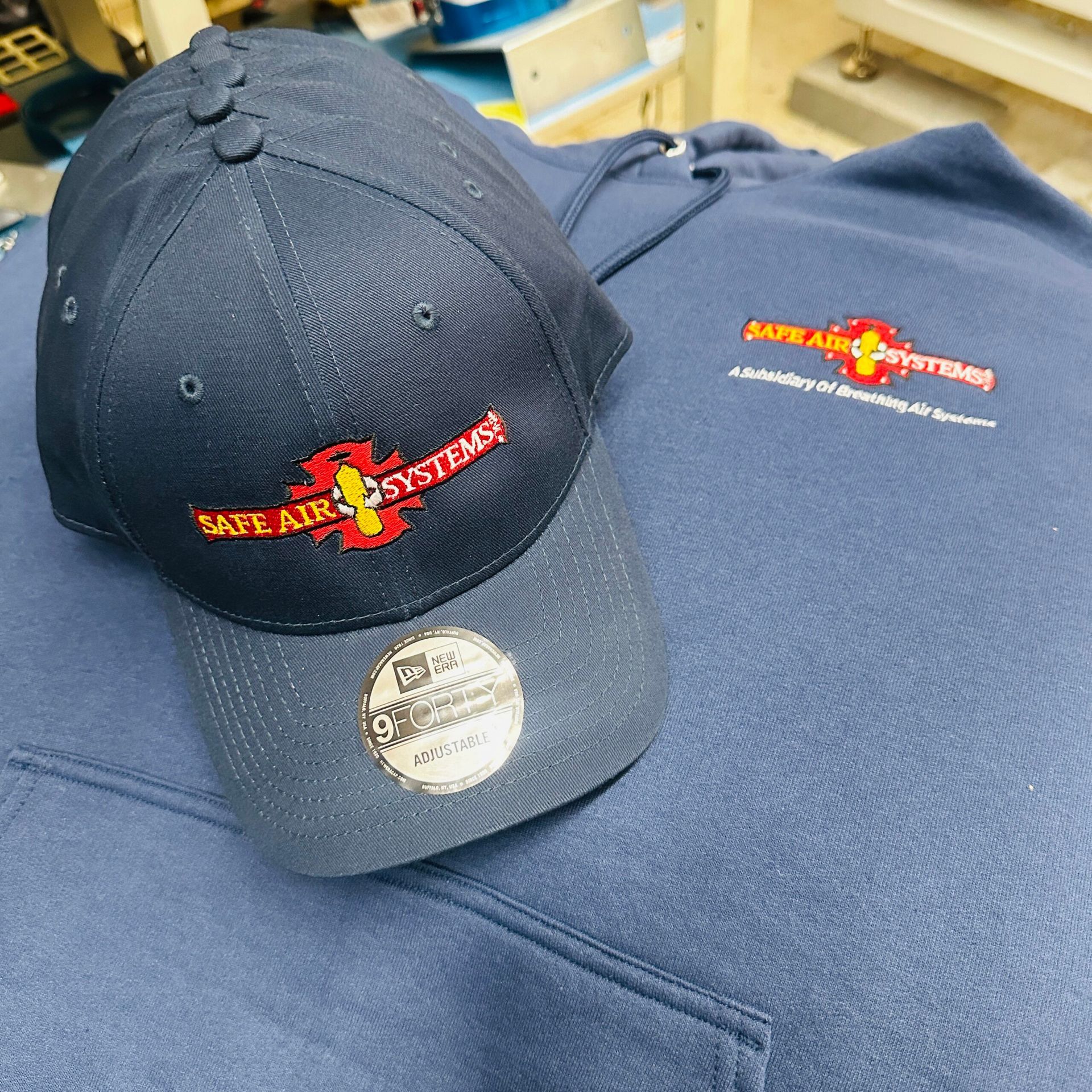 Navy cap and hoodie with 