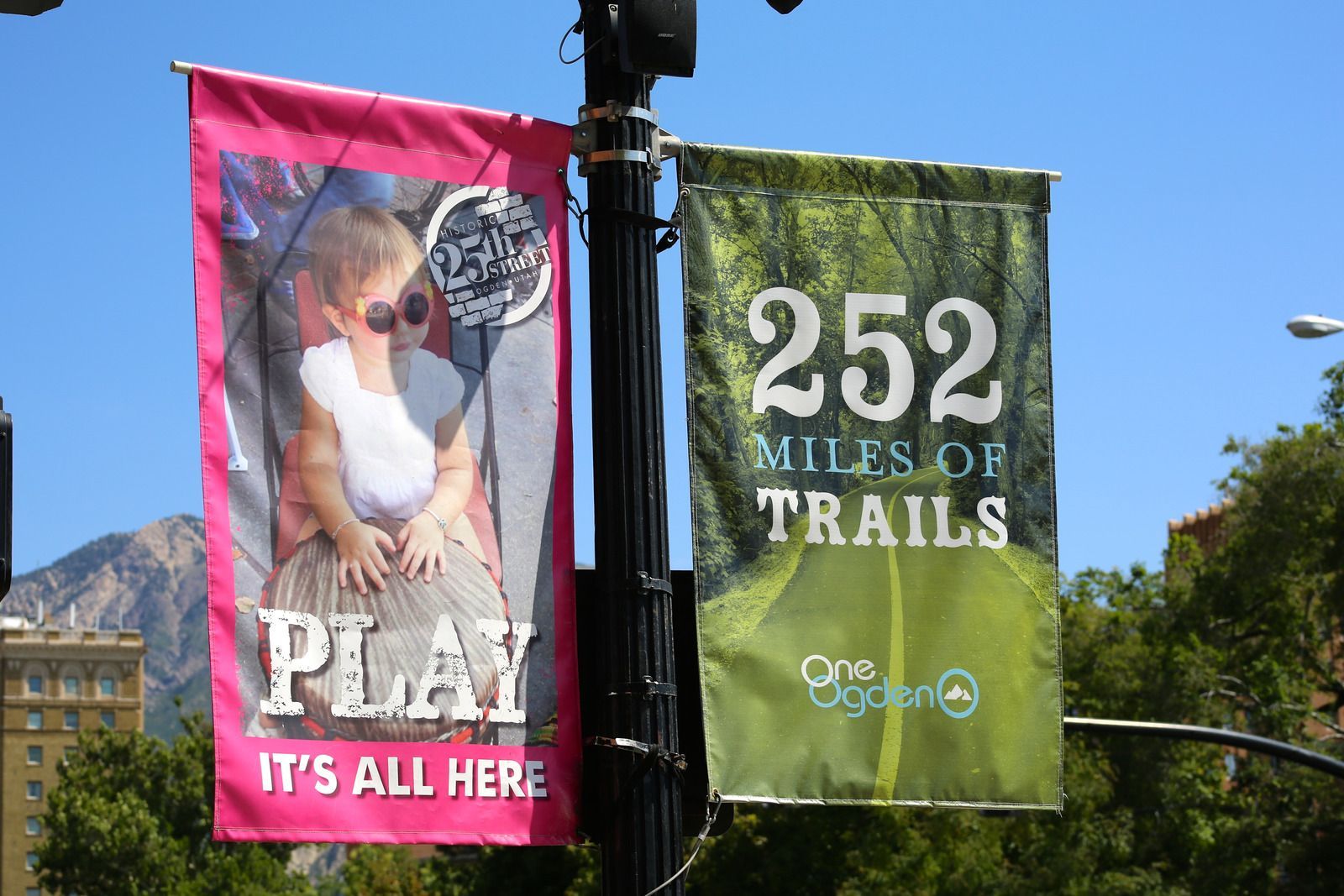 Two banners: Pink banner says