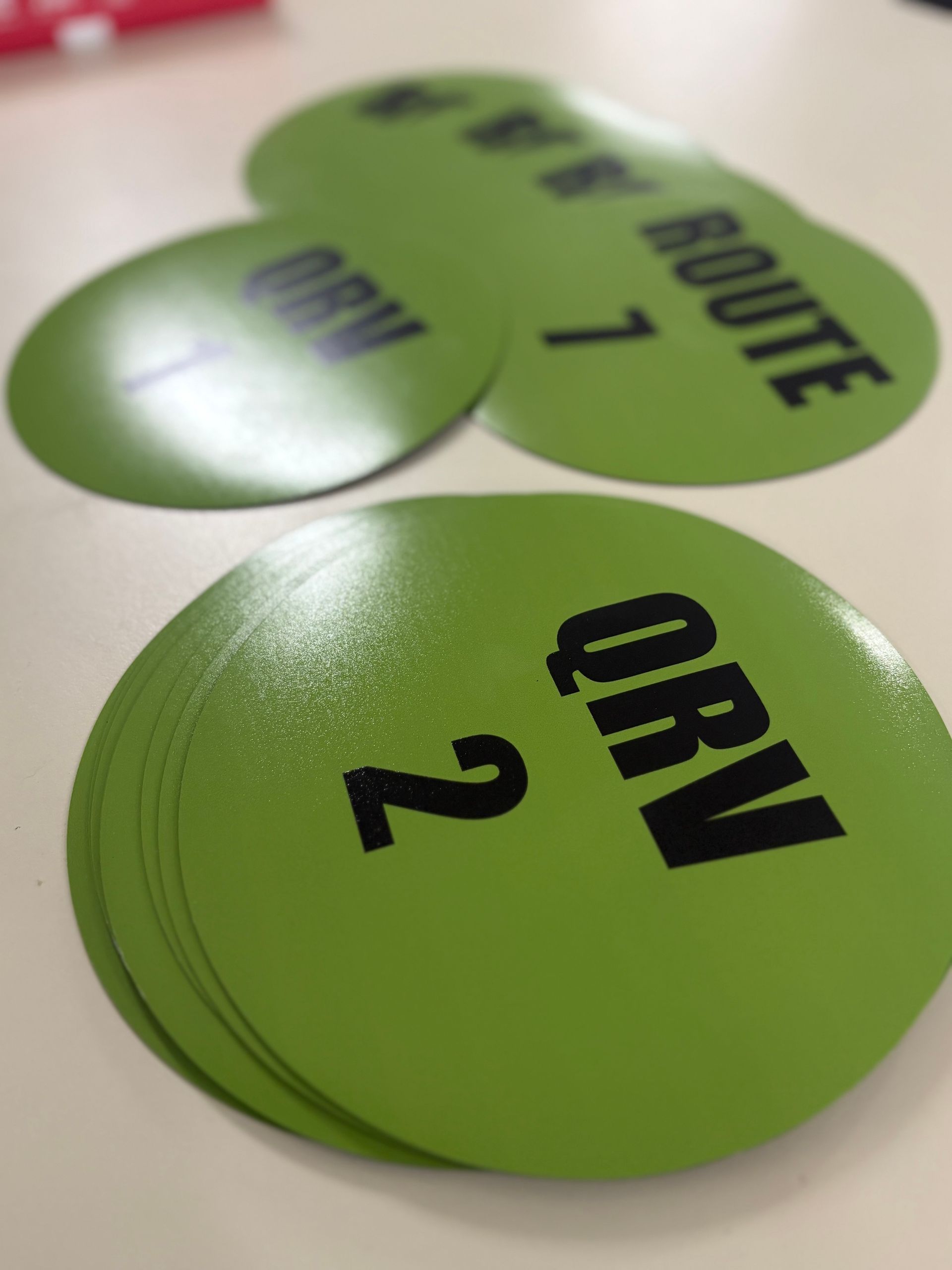 Green oval route markers labeled