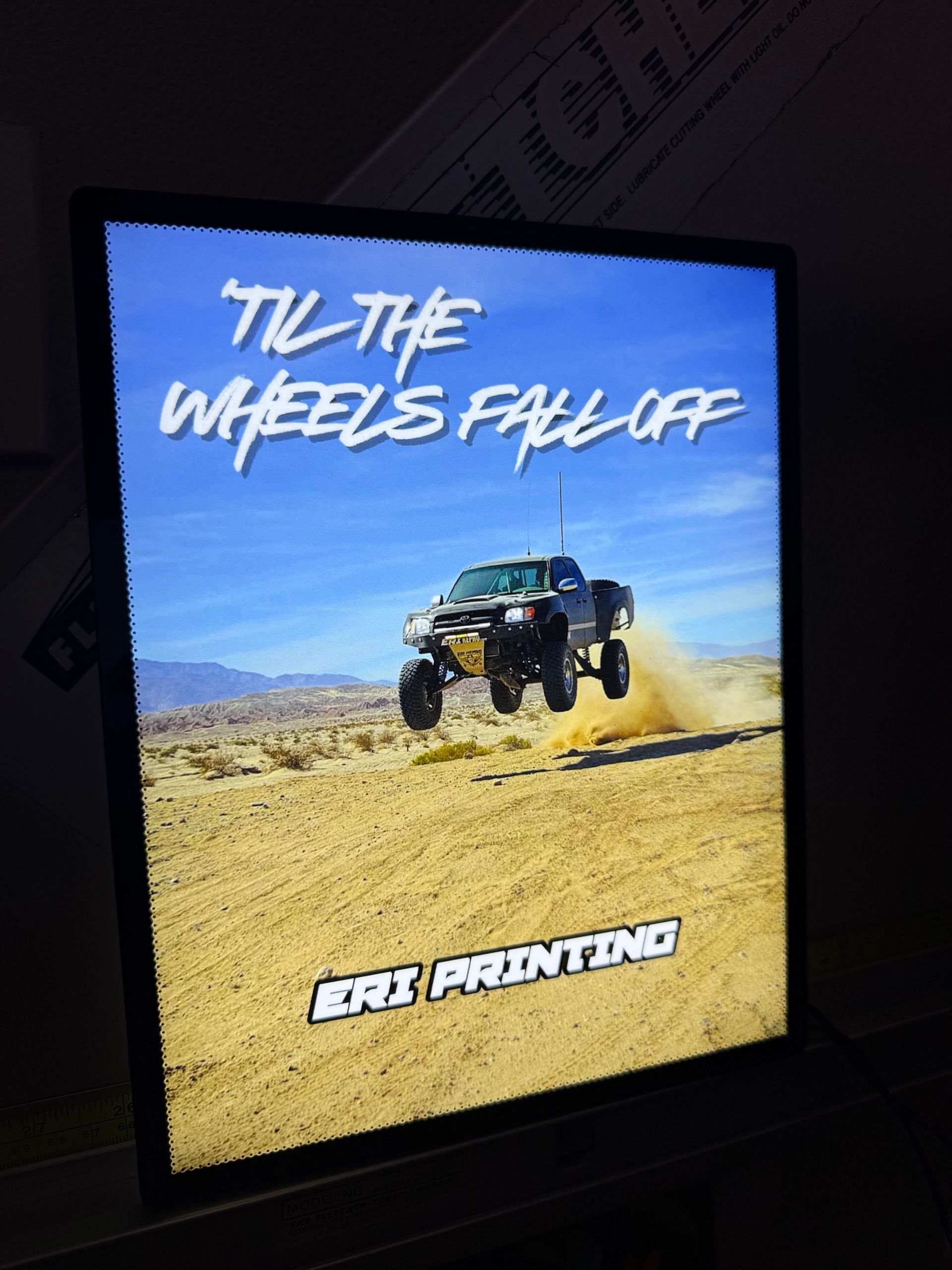 Off-road dune buggy airborne in a desert, with “THE WHEELS FALL OFF” and “ERIC PRYOR” text.