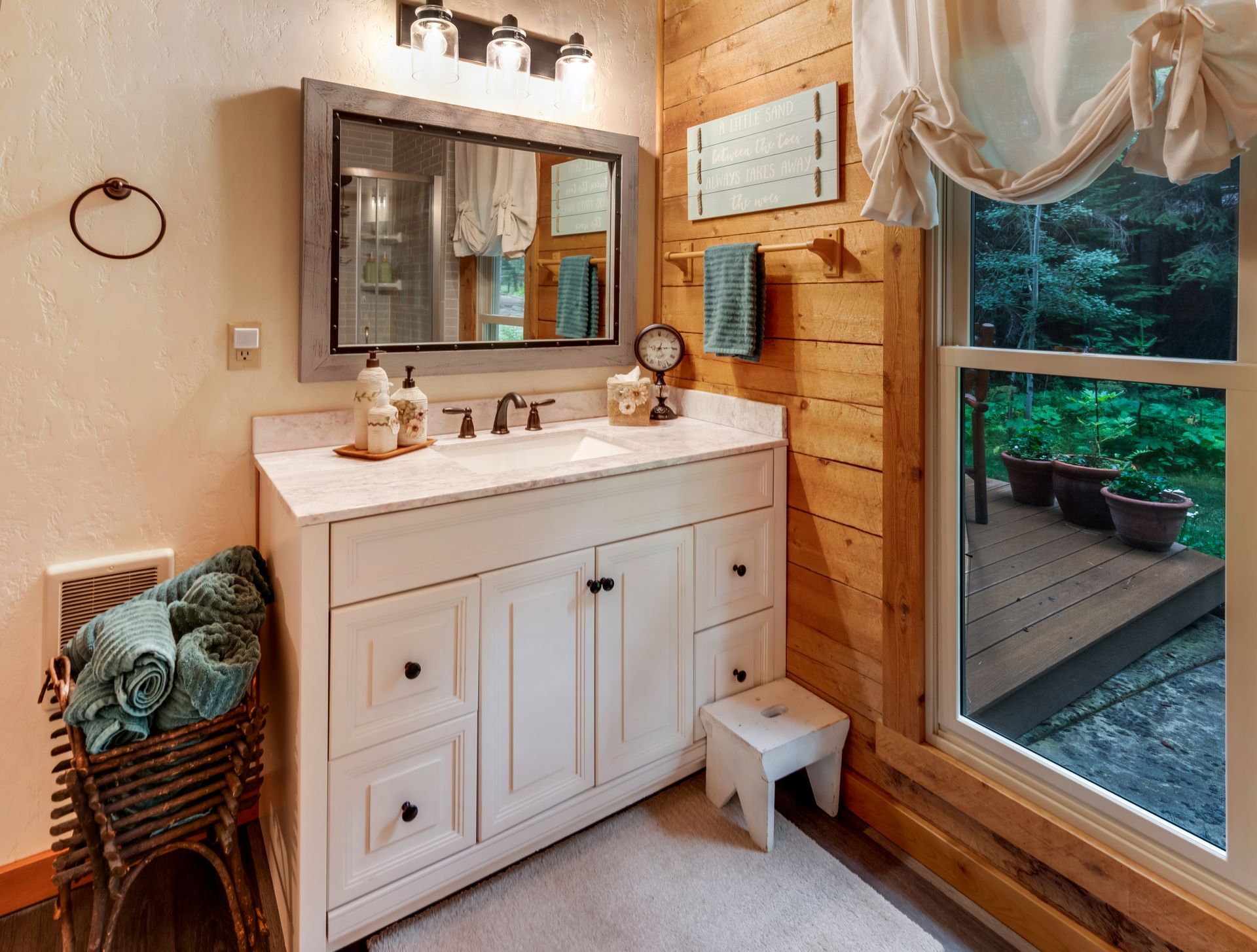 Completed luxury walk-in shower remodel with frameless glass and stone tile