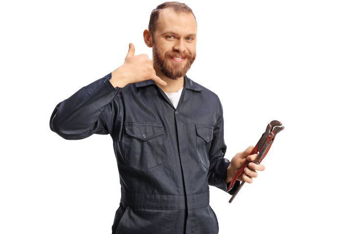 Man Wearing with Tools on Hand — Oxford, Georgia — Brown & Cox Inc