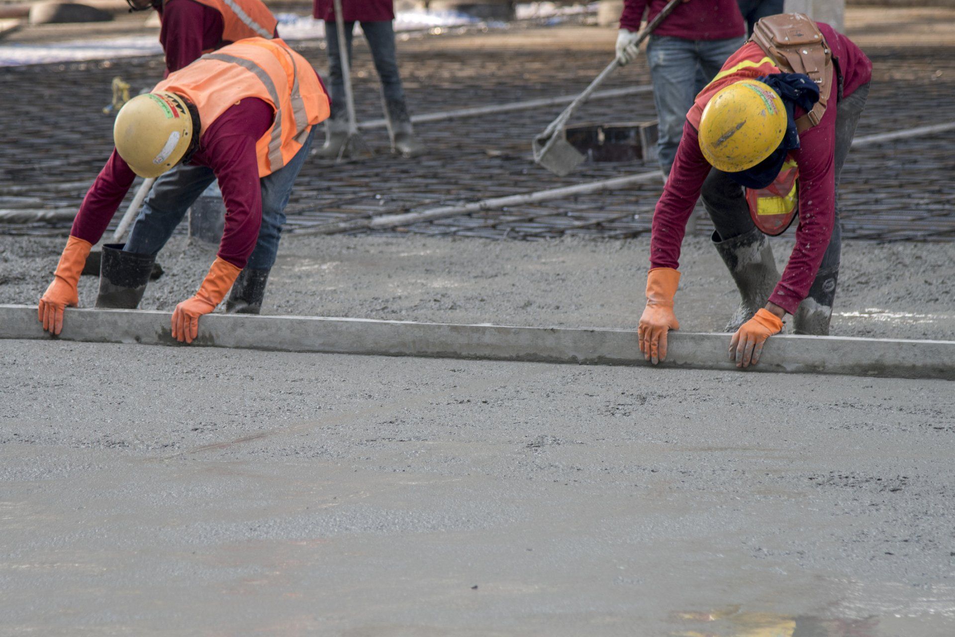 Construction Worker Troweling Wet Concrete – Upper Chichester, PA – Hard Knox Waterproofing