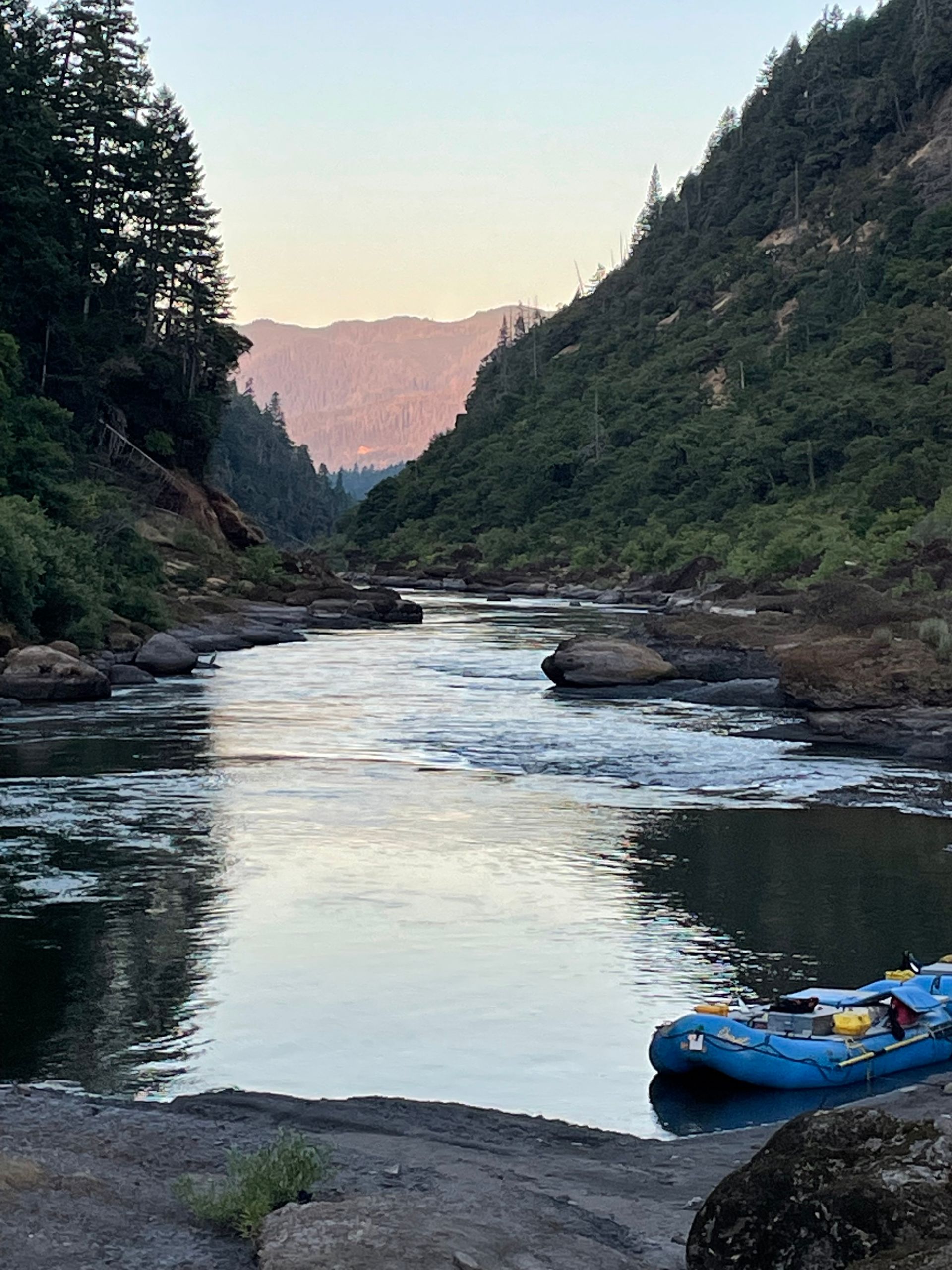 Calm waters and sunset on the Rogue River Wild and Scenic Corridor.