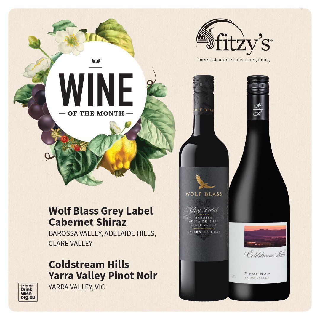 A bottle of wolf blass grey label cabernet shiraz and a bottle of coldstream hills yarra valley pinot noir