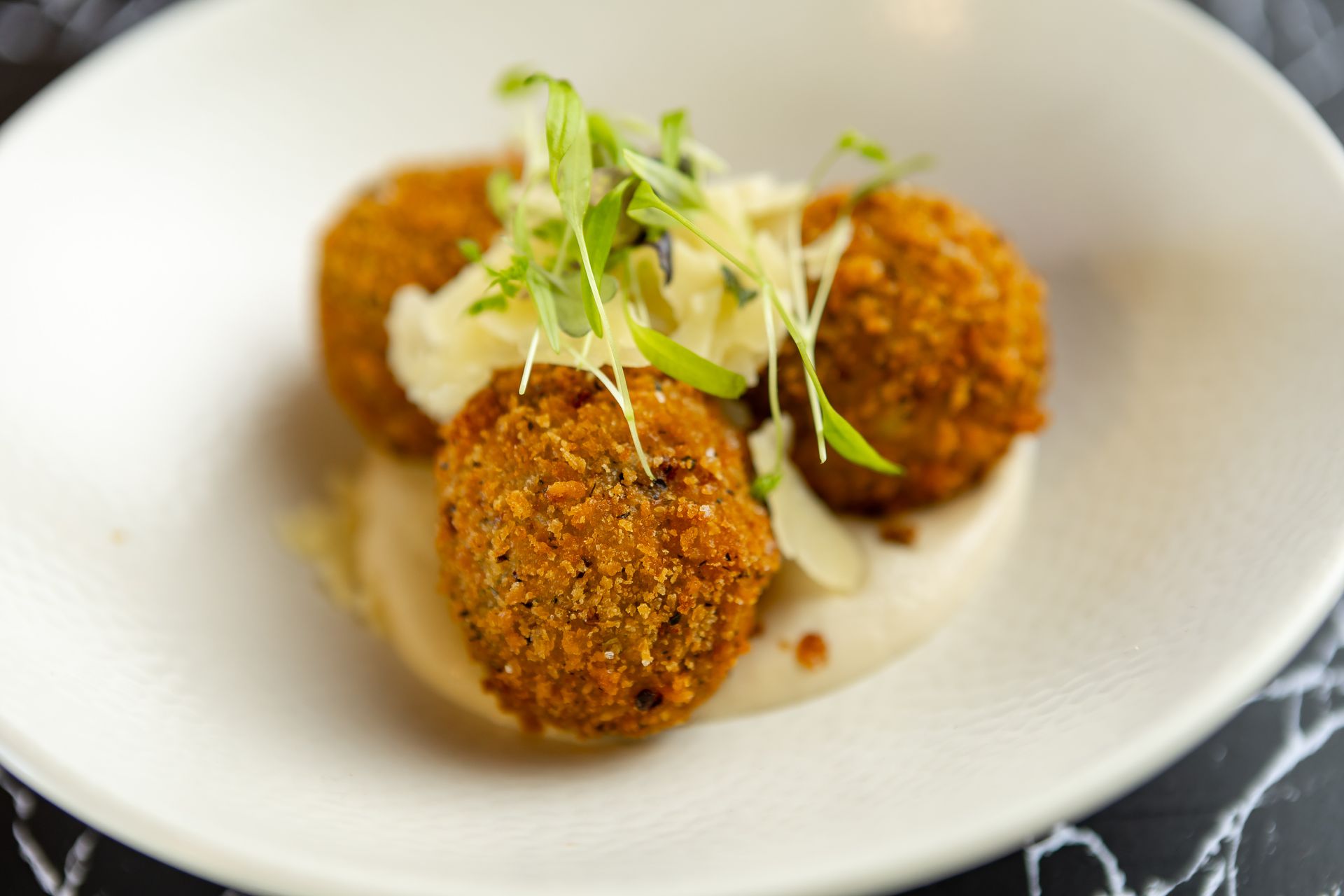 A close up of a plate of food on a table.