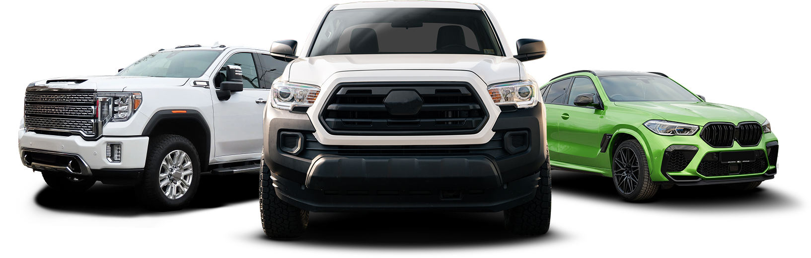 Three pickup trucks in white, black, and green, displayed side by side on a white background | Orem's Garage