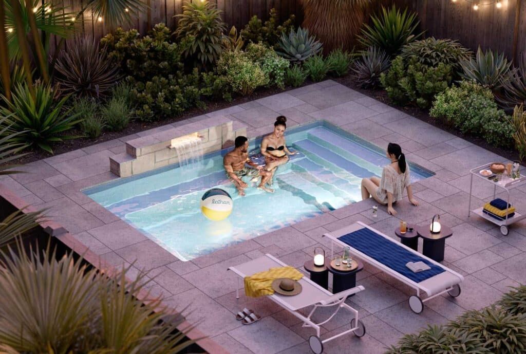 People relaxing in a small backyard pool at dusk, with lounge chairs and string lights nearby