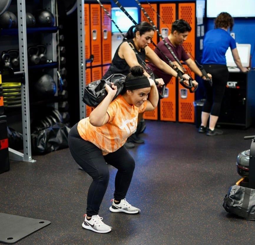 Woman Lifting Weight Bags