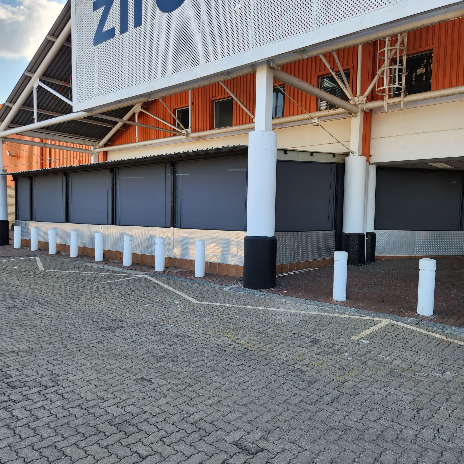 Commercial outdoor roller blinds installed by Sun Shade in Pretoria East.