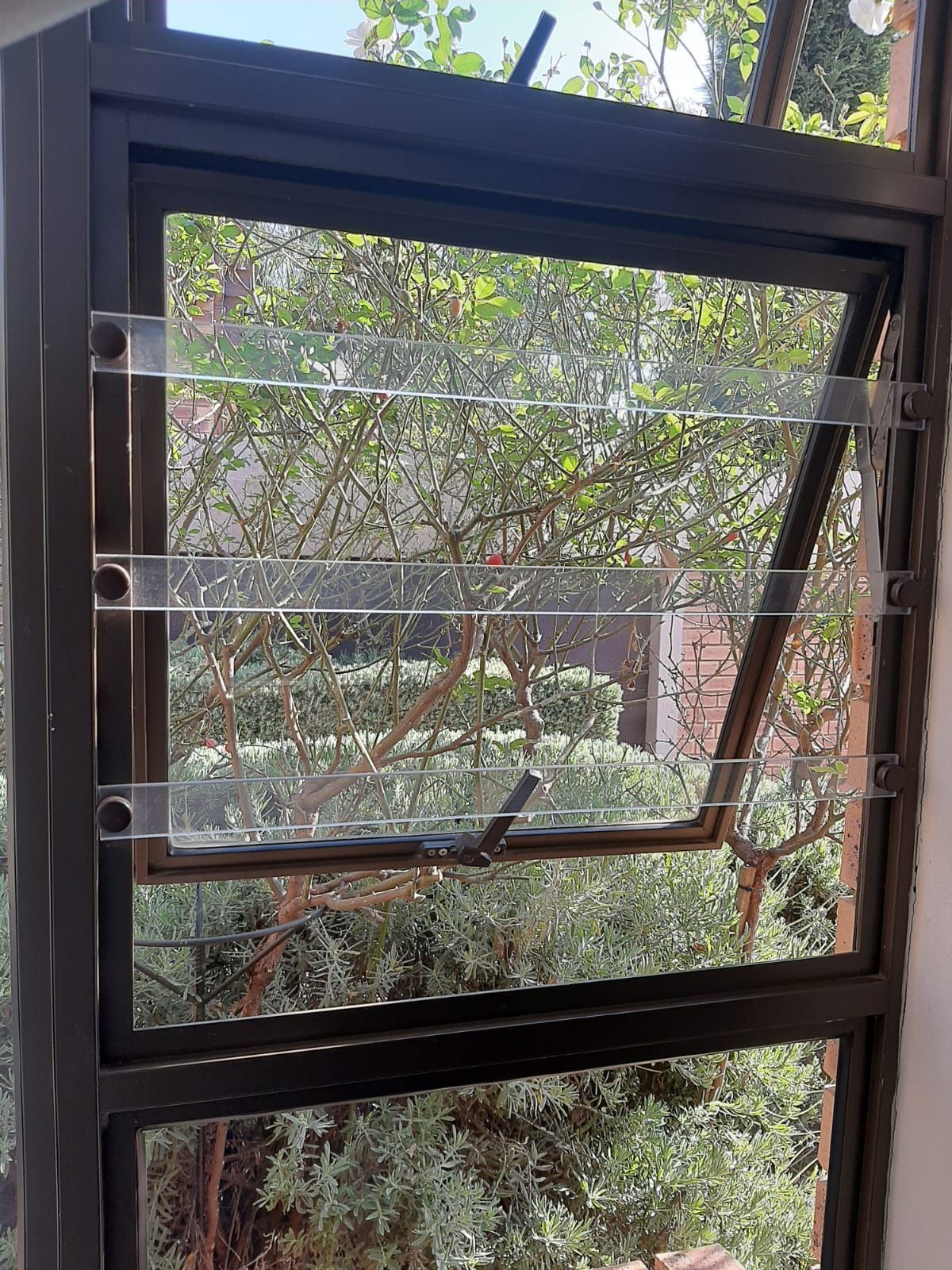 Clear burglar bars installed by SunShade in Johannesburg & Pretoria.