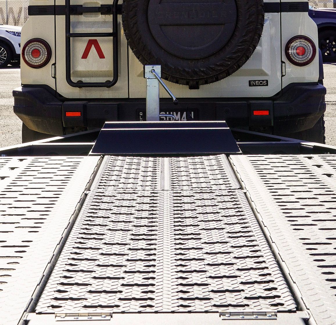 The steel 3mm deck infill on the pro series plant trailer hitched to a 4x4 for small machinery transport.