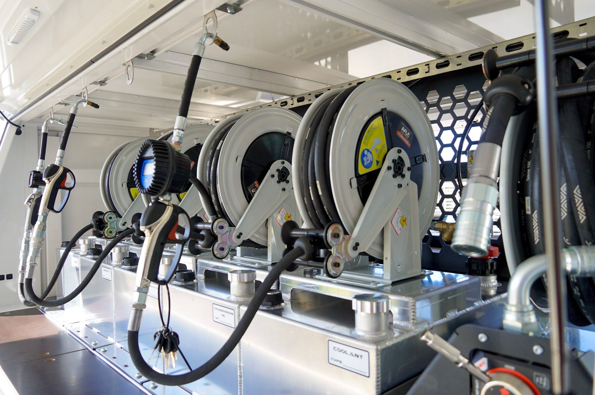 New oil hose reels installed inside ox trailers service trailer for diesel mechanics.