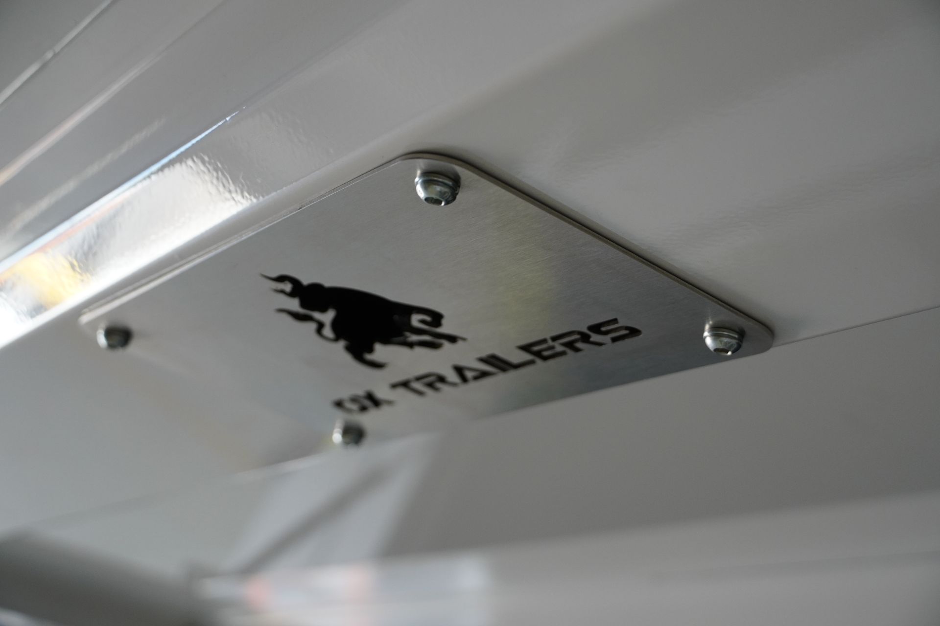 laser cut ox trailers logo on the side door of an australian made service trailer
