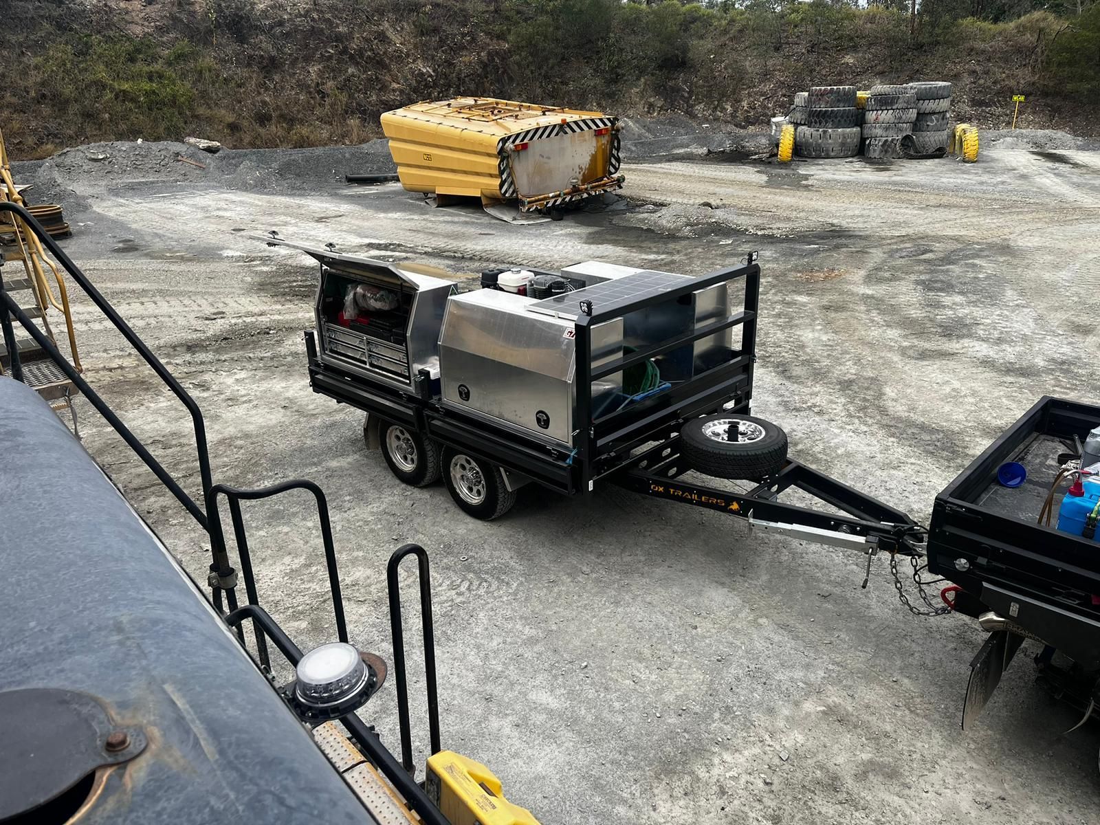 Top view of Henri Diesel Repairs flat top trailer that he uses for mobile servicing.