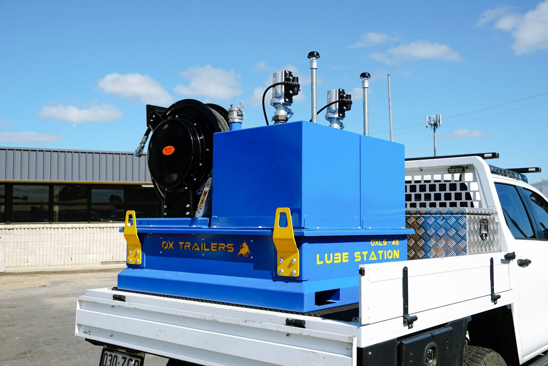 Fully bunded, custom-made lube station by ox trailers installed on the back of a ute for mine site use.