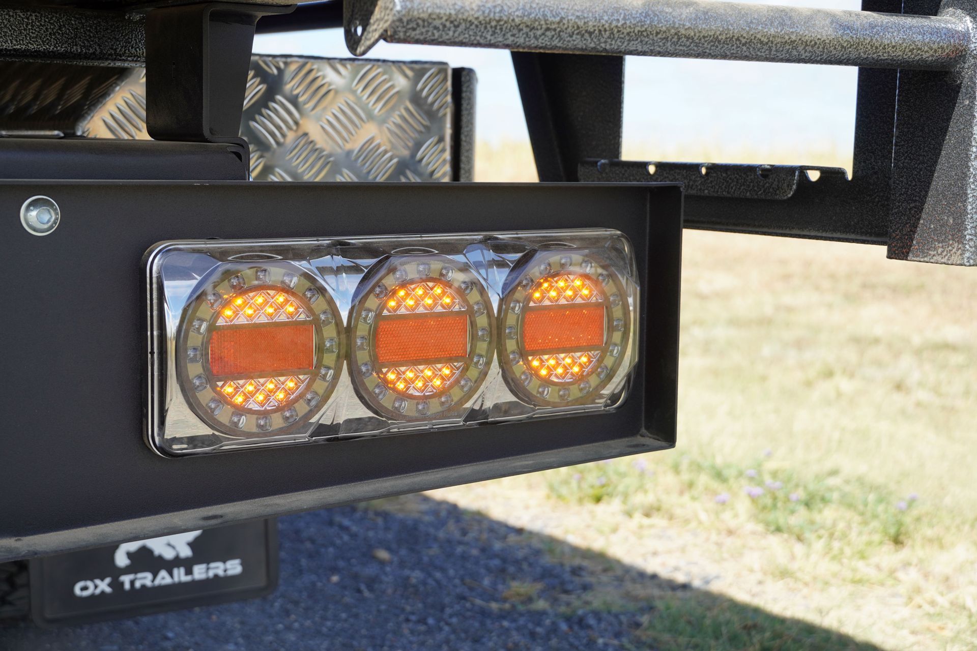 The Maxilamp Taillights of a Flat Top Trailer